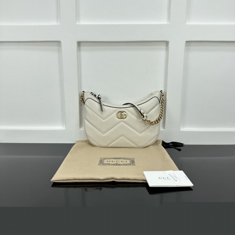 G*u*i top handle bags